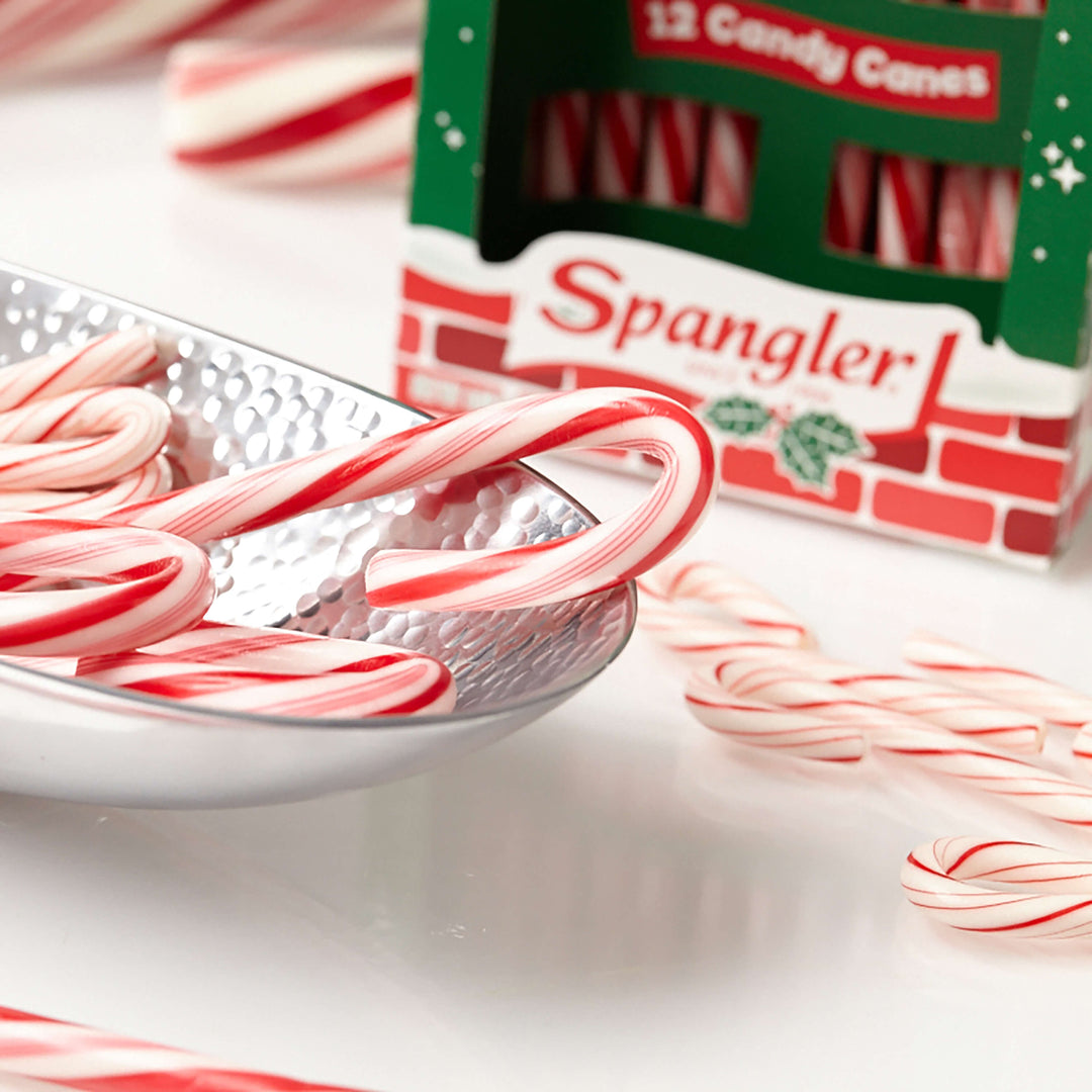 Carousel Image: Lifestyle image of candy canes in a bowl